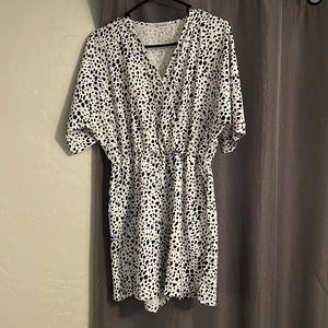 Beachsissi White with black polka dots romper. Ties around waist. New with tags
